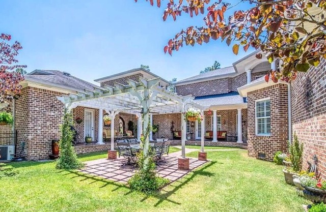 Beautiful 6 bedroom home with a brand new swimming pool, and 4 fireplaces.