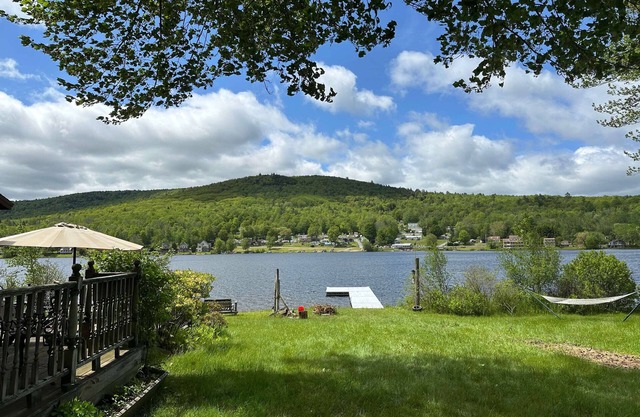 Beautiful 6 Bedroom Lakefront Home w/Own Dock. Please note that this home does not have air conditioning. Box fans are provided and because of our proximity to the lake, it is cooler in the evenings.