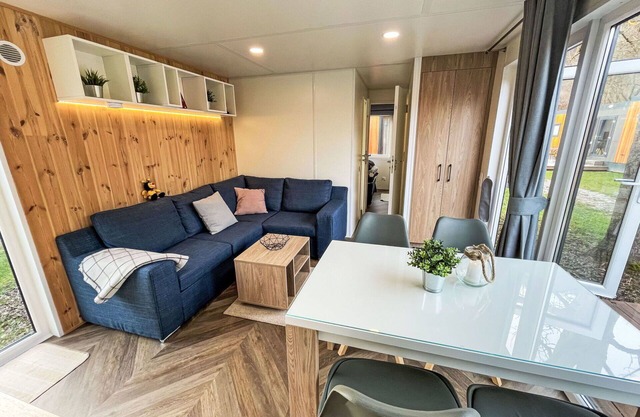 Joli appartement dans une maison de vacances avec WIFI, TV, terrasse et parking