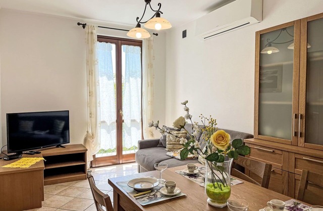 Joli appartement pour 5 personnes avec WIFI, TV, patio, animaux admis, vue panoramique et parking