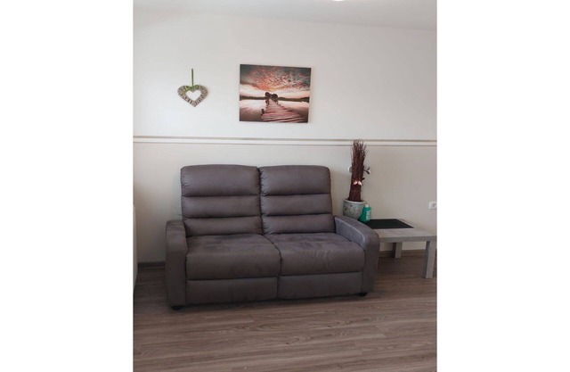 Confortable appartement dans une maison de vacances avec WIFI, TV, patio, animaux admis et parking