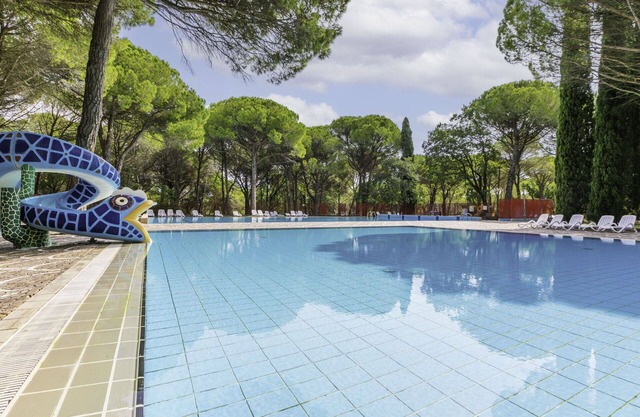 Agréable appartement dans une maison de vacances avec climatisation, piscine, WIFI, TV et terrasse