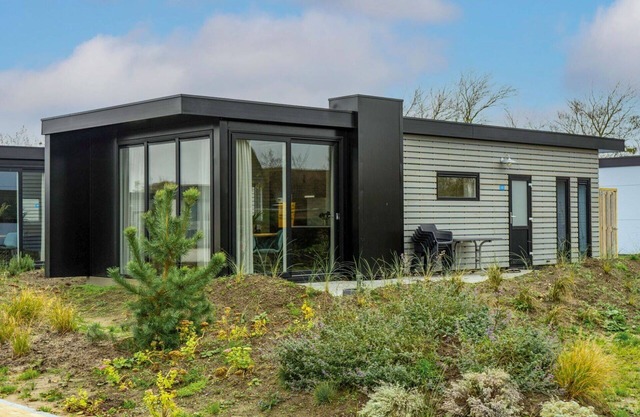 Bel appartement dans une maison de vacances avec WIFI, climatisation, TV, terrasse et parking