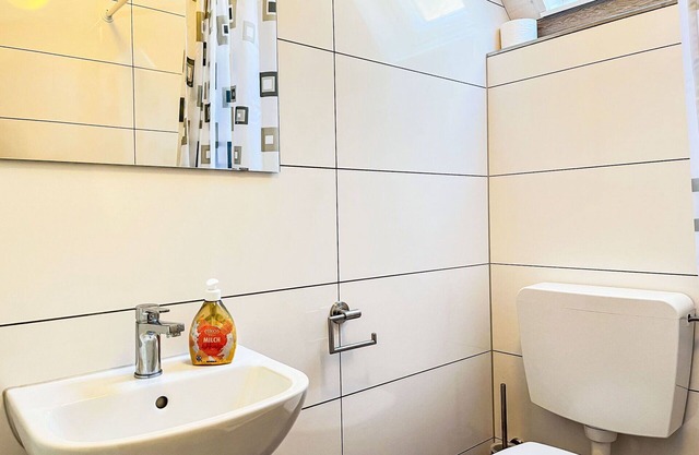 Joli appartement dans une maison de vacances avec WIFI, climatisation, TV et patio