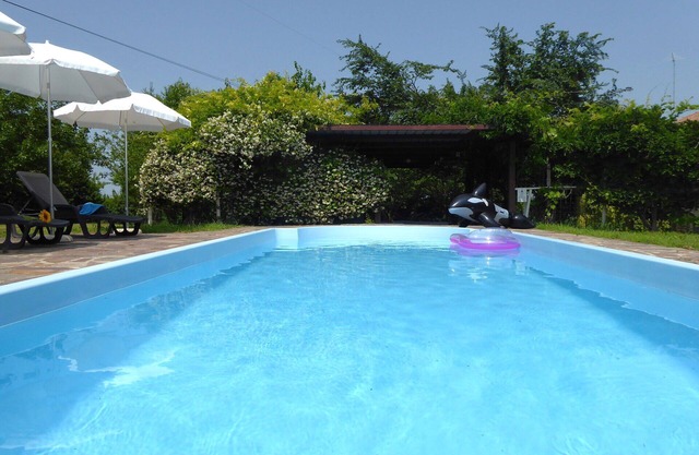 Confortable appartement dans une maison de vacances avec WIFI, climatisation, piscine et terrasse