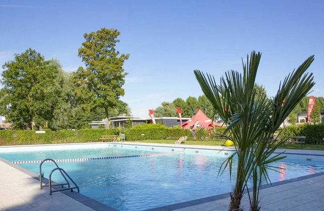 Agréable appartement dans une maison de vacances pour 6 personnes avec WIFI, piscine, TV et parking
