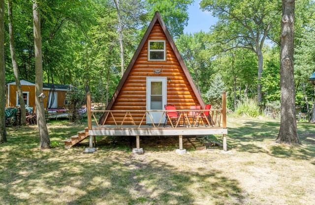 Beautiful cabin on lake with a dock on 1.5 acres private property