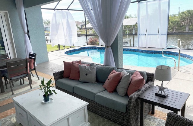 Beautiful canal front home, private screened pool, gulf access, dock, boat lift