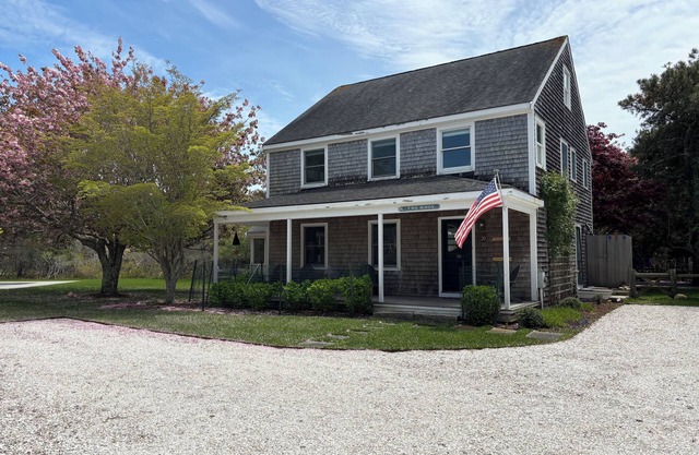 Beautiful home with oversized pool and hot tub, spacious yard, walk to beach