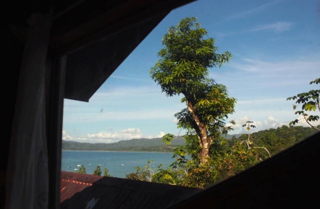 Belle maison avec vue panoramique sur la baie et les jardins