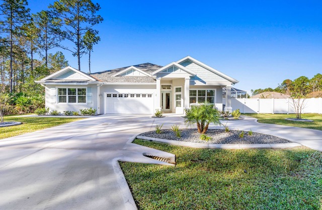 Beautiful house with heated pool, full kitchen, central AC, and washer/dryer