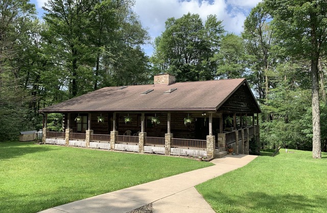 Beautiful log home retreat located on the Northwest peak of PA/ New York boarder