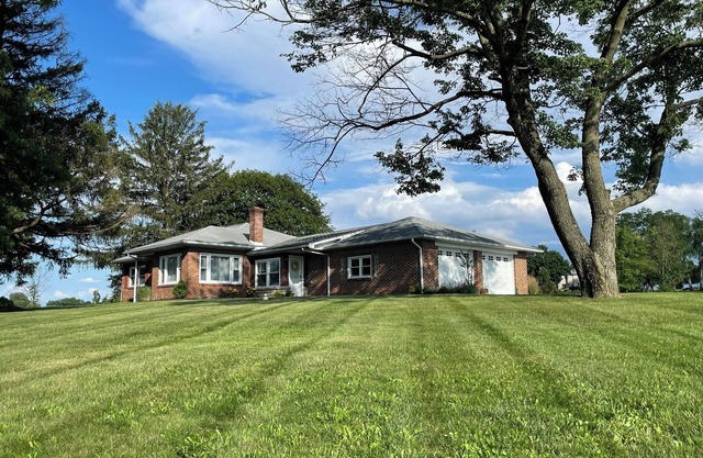 Beautiful open and spacious ranch home in country setting