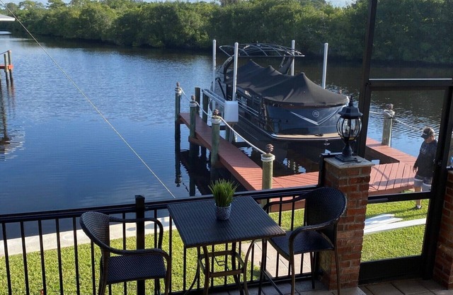 Beautiful ranch home on quiet canal with ocean access and spa.