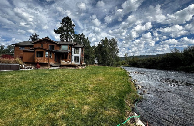 Beautiful river front home with fly fishing skiing hiking kayaking and much more