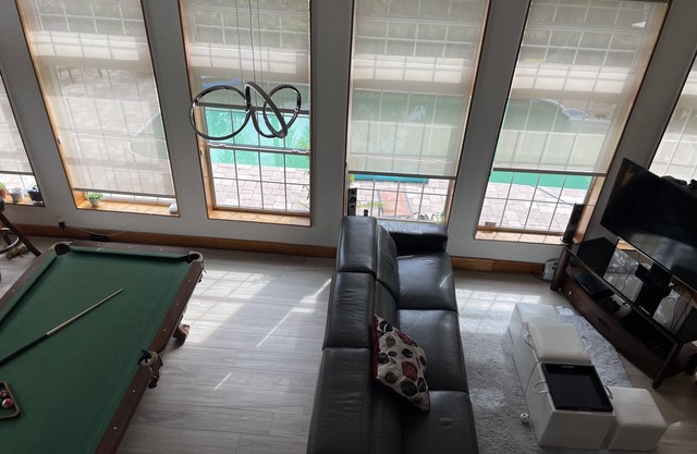Belle maison S Tampa avec piscine chauffée et jacuzzi, Wi-Fi, câble, DVD, ping-pong,