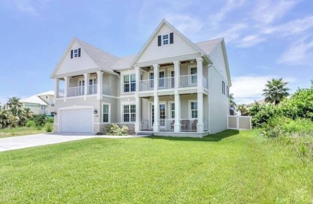 Beautiful two-story single family beach home with a private pool and ocean views