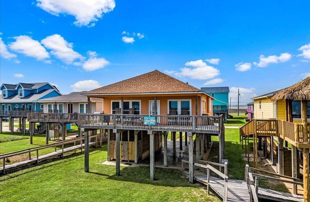Beautiful Views everywhere you look! Great property steps to the sand!