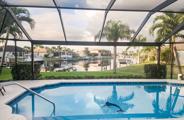 Beautiful, waterfront home with amazing view, private heated pool, & central AC