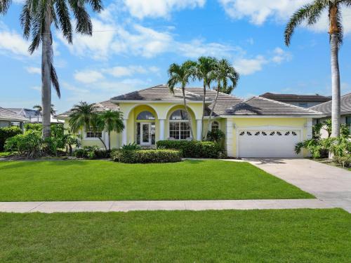 Beautifully maintained waterfront home with pool