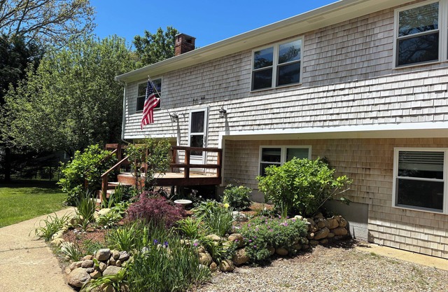 Beloved 5-bedroom house in charming Tisbury with AC, fenced in yard, and hot tub
