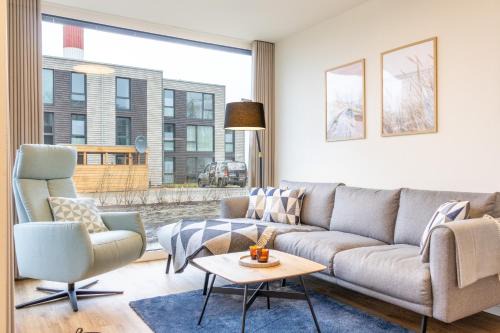 BeltBlick 19 – Exklusive Ferienwohnung mit Garten und Meerblick