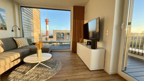 BeltBlick 30 – Moderne Ferienwohnung mit Dachterrasse direkt an der Ostsee!