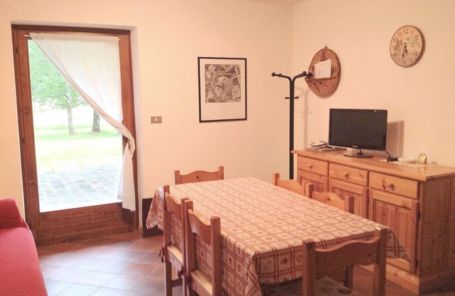 Jolie maison de vacances avec jardin près de Pozza di Fassa