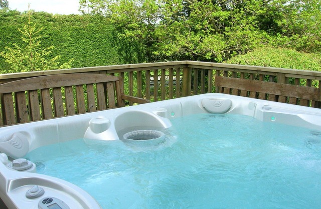 Maison individuelle de 3 chambres avec son propre bain à remous privé à l'extérieur et WI FI gratuit.