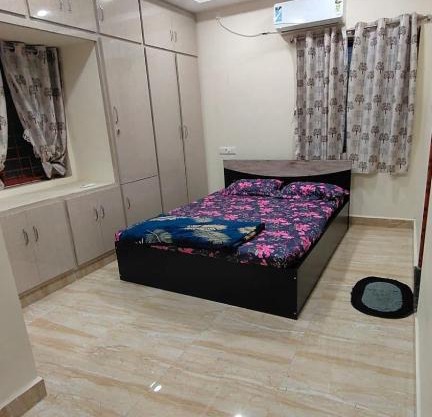 Bhakti Bliss Homestay - 1BHK modern Apartment with AC, Wifi and Android Tv- 2mins from Highway