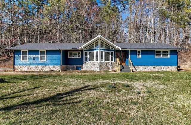 Bigfoot Manor is a Lovely Home in Marion with a Large Yard and Firepit