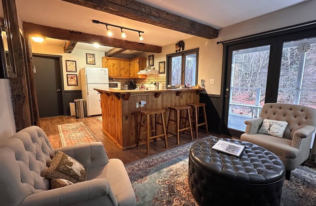 Black Bear Suite - Amazing 2BR suite with deck overlooking the Trout River & only 7 minutes to Jay Peak Resort. With Breakfast Included!