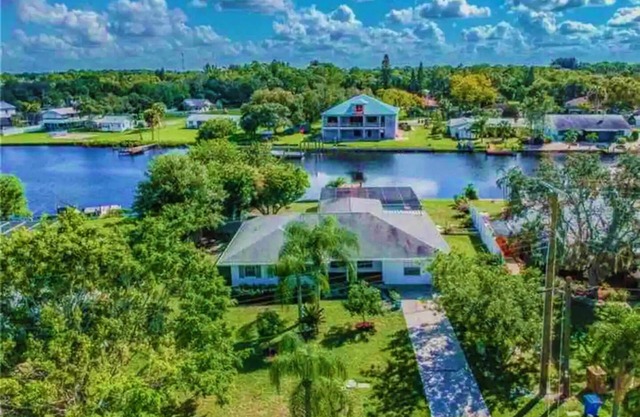 Blue Heron House | Private 4 BR Waterfront w/ Heated Pool and Fire Pit