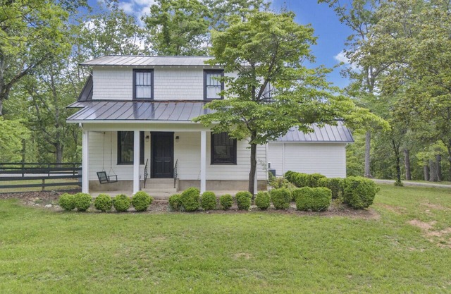 Private farmhouse on 5+ acres—comfortable, cozy and charming!