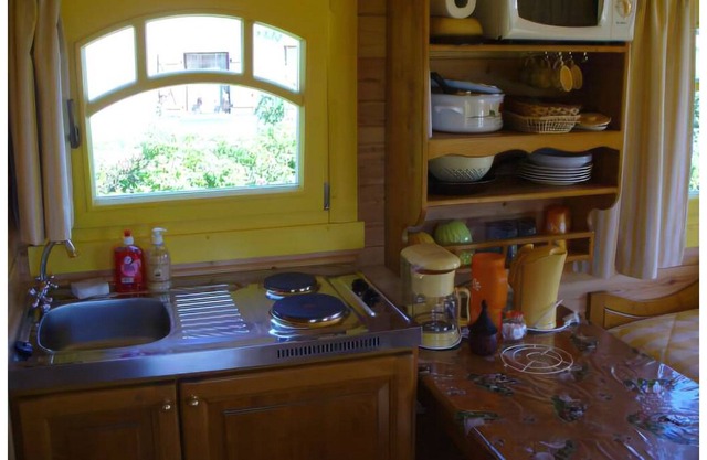 séjour bohème à la ferme, à bord d'une roulotte confortable et chaleureuse