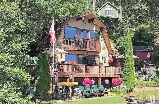 BOLTON/NORTHWEST BAY LAKEFRONT HOME WITH PRIVATE BEACH
