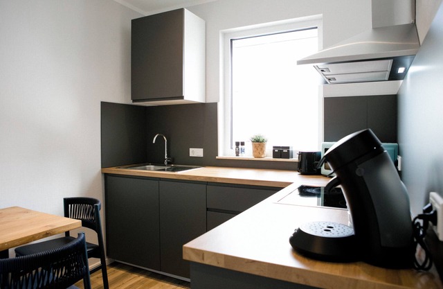 Timeless, modern apartment with fully equipped kitchen, air conditioning & parking space