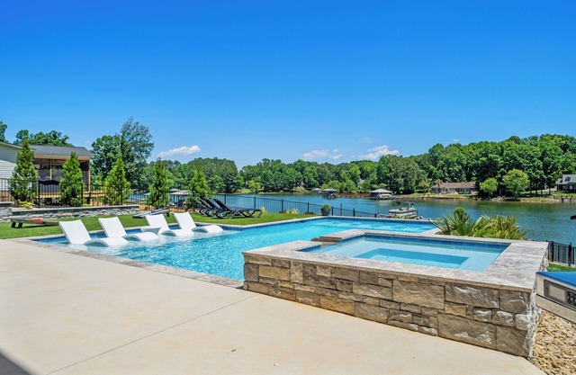 Brand New 4000+ sq ft house with pool, hot tub, amazing deck and amenities