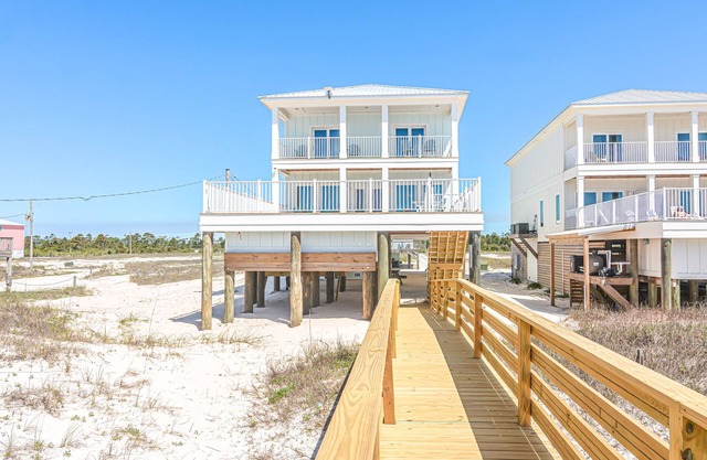 BRAND NEW GULF FRONT HOME WITH A PRIVATE POOL AND AN ELEVATOR!