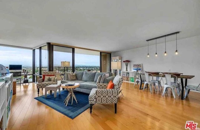 Remodeled resort-like two-bedroom condo w/panoramic view heated pool, and more.