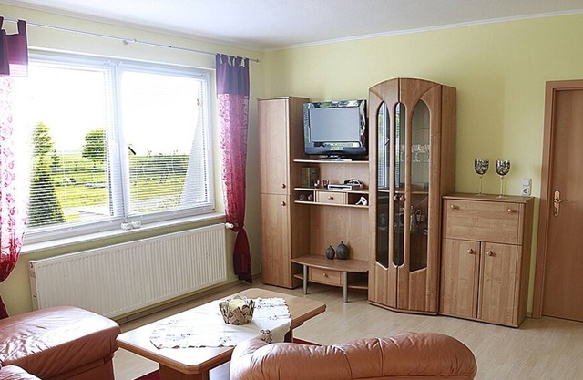 convivial et lumineux appartement donnant sur le lac Kummerow, de plain-pied