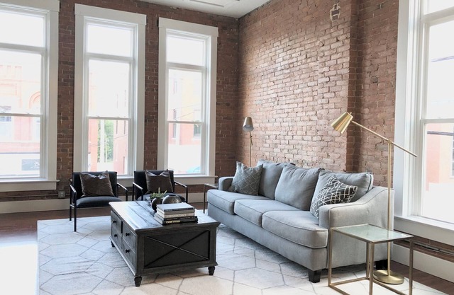 Bright and Spacious Historic Brick Loft off the square in Paola