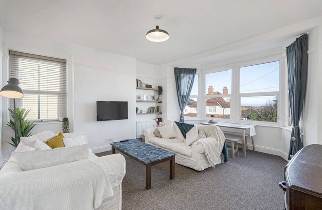 Bright Apartment w/ Parking & Distant Sea Views