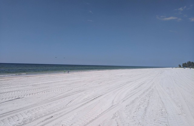 Bright Condo with Private Beach Access and Short Drive to Cities and Parks