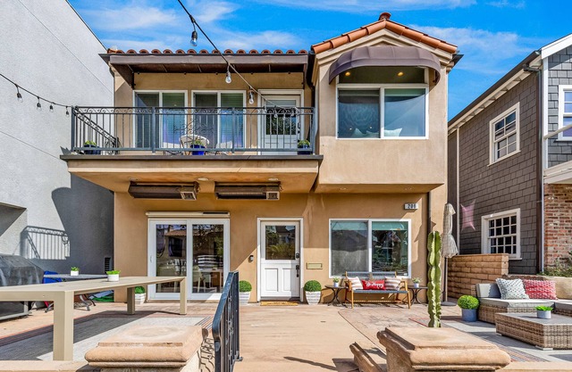 Bright home on the channel with expansive patio & elevator