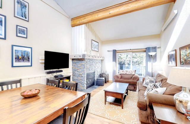 Bright, welcoming condo with pool, hot tub, gas fireplace, fitness room, balcony