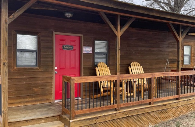 Buffalo River Cabin has 1 bedroom with queen size bed, 1 twin bunk bed in hallway, 1 futon in main l