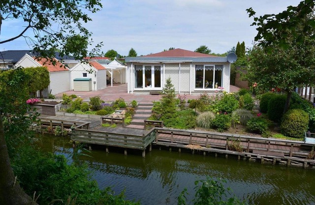 Bungalow spacieux avec terrasse couverte