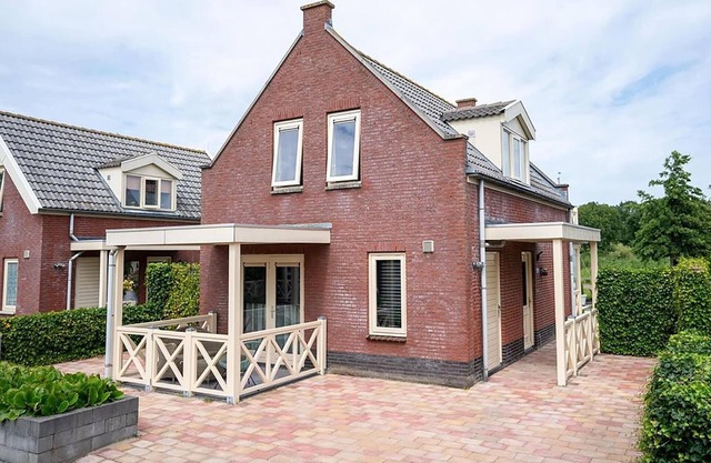 Maison de vacances confortable au bord de l'eau