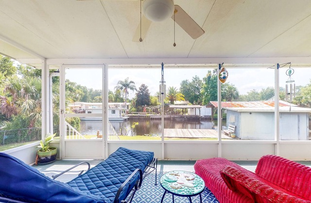 Canal-Front Home with Private Covered Boat Dock & Waterfront Screened Porch